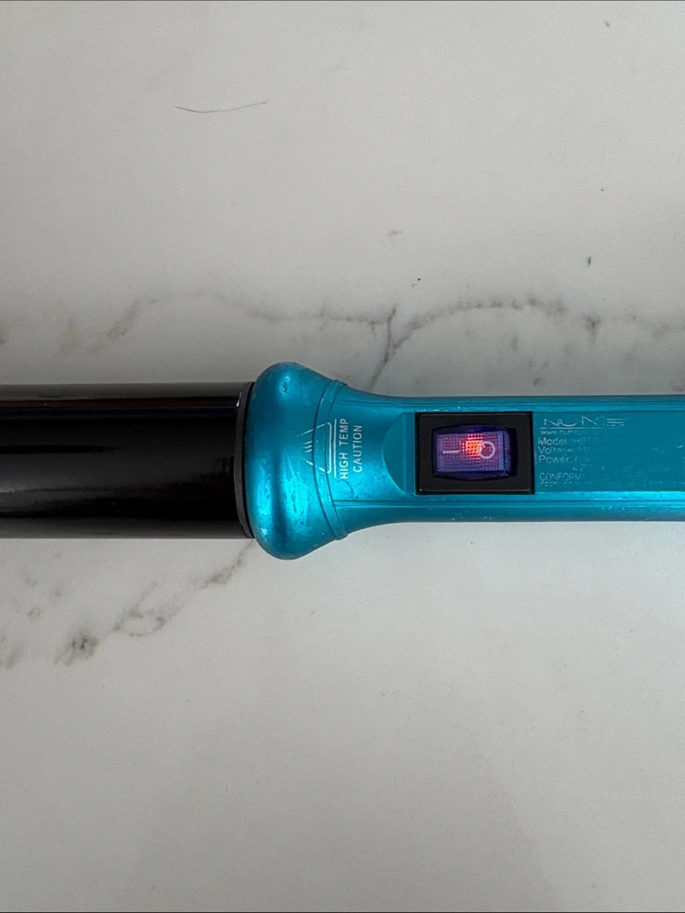 NuMe sleek curling